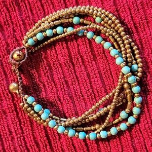 5 strand Tourquoise Colored gold Tone Bracelet 7"